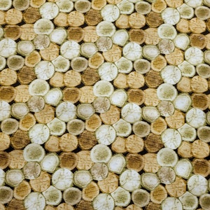 May include: A seamless pattern of brown, beige, and green wood slices arranged in a staggered pattern. The wood slices are all different sizes and shapes, and they are arranged in a way that creates a natural and organic look.