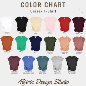 May include: Color chart for unisex t-shirts showing 18 different colors, including white, black, sand, pink, red, maroon, autumn, kelly, navy, military green, heather peach, heather mauve, heather maroon, columbia blue, heather deep teal, athletic heather, dark grey heather. The chart is titled "Color Chart Unisex T-Shirt" and has the text "Alfirin Design Studio" at the bottom.