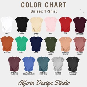 May include: Color chart of unisex t-shirts in various colors, including white, black, sand, pink, red, and maroon. Additional colors are autumn, kelly green, navy, military green, heather peach, and heather mauve. The text "Alfirin Design Studio" is at the bottom.