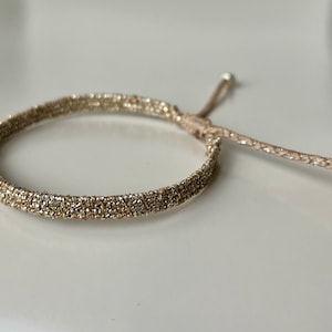 Pulsera de oro tejida muy estrecha. imagen 3