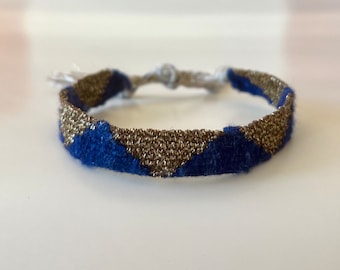 Woven bracelet made from recycled denim threads and linen
