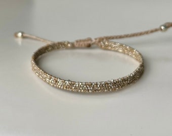 Very narrow woven gold bracelet