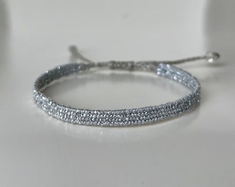 Very narrow woven silver bracelet