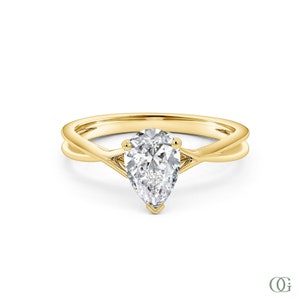 Dainty Petite Elegance Pear Shape Engagement Ring (1.15 CTW)