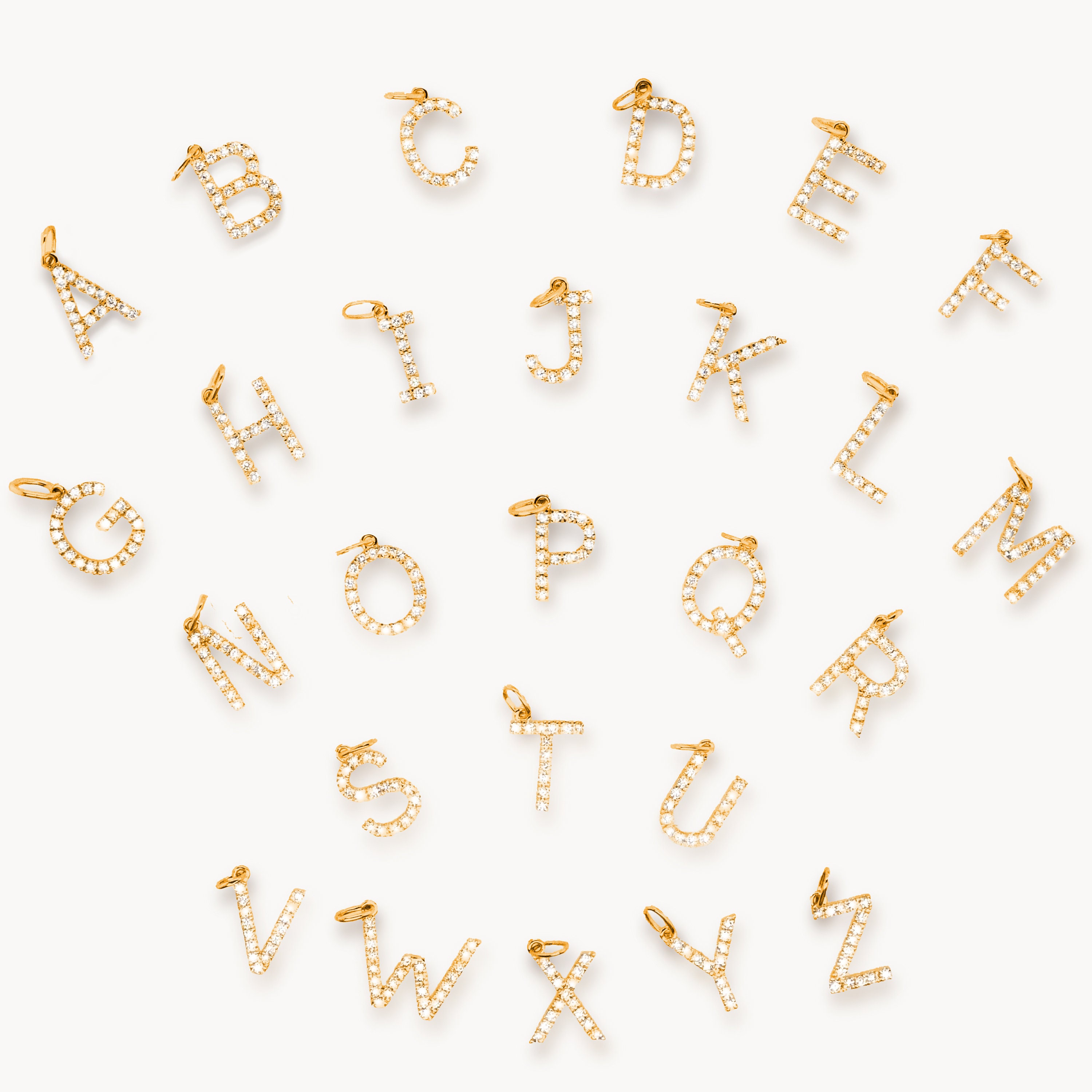 Gold letter charms shop with diamonds