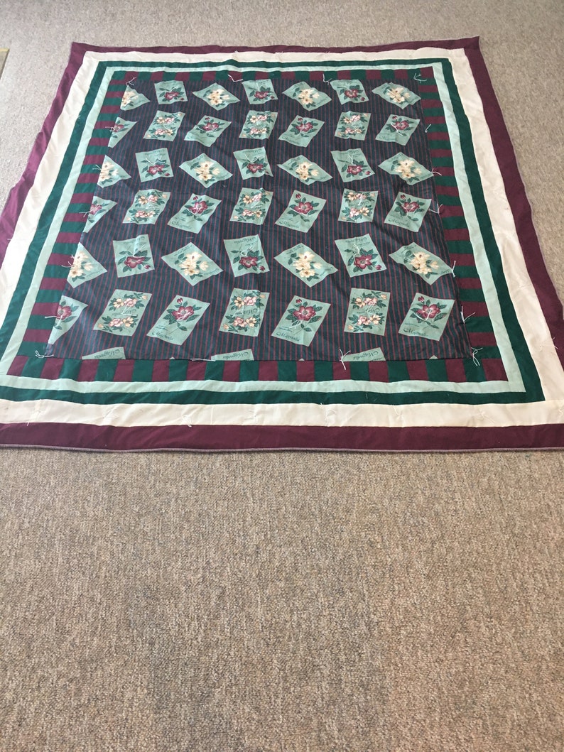 Maroon and green seed packet quilt with SURGED edging | Etsy