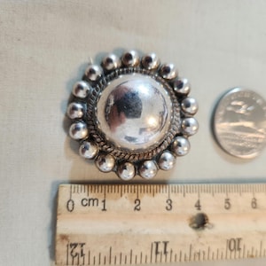 Vintage collectible mexico sterling silver womens pin or brooch  35 millimeters gdiameter weighs 20 grams. Hallmarked  Mexican silversmith