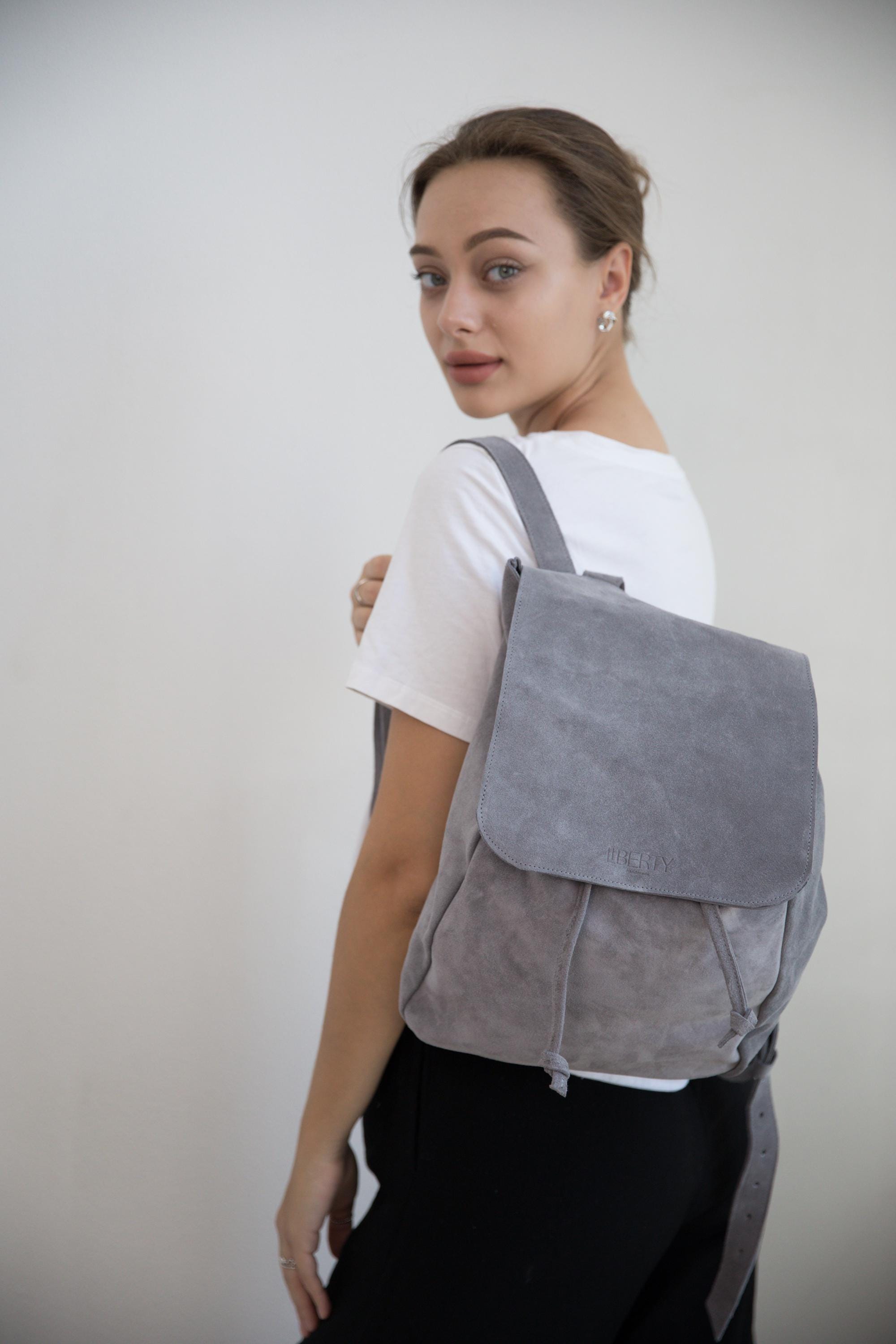 grey suede mini backpack The Each item in this collection is built with city Suede Leather mini backpack |