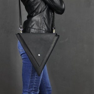 Genuine leather women triangle shoulder bag.