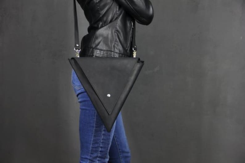 Genuine leather women triangle shoulder bag.