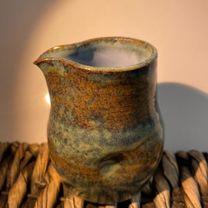 Little milk jug with dimples