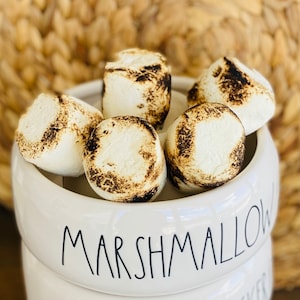 Loose marshmallows, roasted fake marshmallows, faux burnt marshmallows, fake food