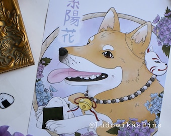 May include: A digital illustration of a Shiba Inu dog wearing a beaded necklace with a bell and a fox mask. The dog is holding a rice ball in its paws. The background is a circle with purple and blue flowers and the text "柴  狐  花" in Japanese.