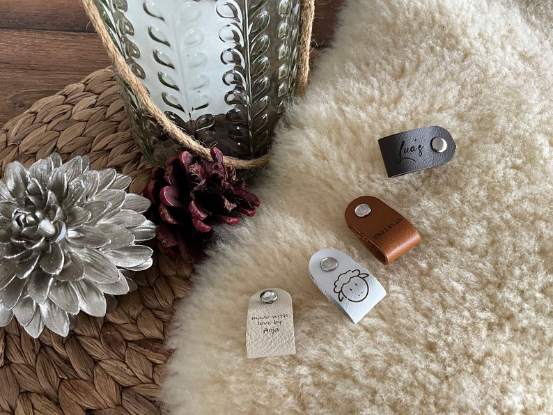 May include: A handmade wooden sign with the text "Welcome" in a playful font. The sign features a distressed finish and a simple, rustic design, perfect for a front door or entryway. The sign is approximately 12 inches wide.