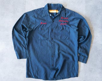 Vintage 70-tals mekanikerskjorta med knäppning i bilens design