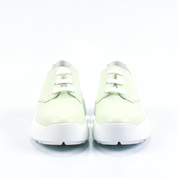 light green sneakers