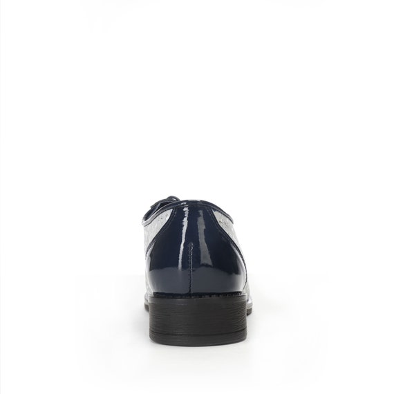 blue and white saddle oxfords