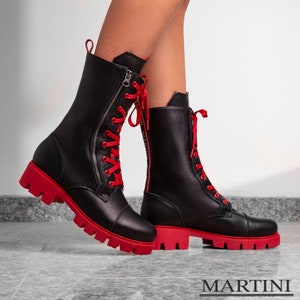 black boots with red soles