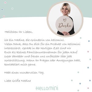 May include: A circular wooden sign featuring the word Danke and a small heart icon, held by a person. The image includes a message in German starting with Hall&ouml;chen Ihr Lieben, followed by text about the brand hellomini and a closing signature.