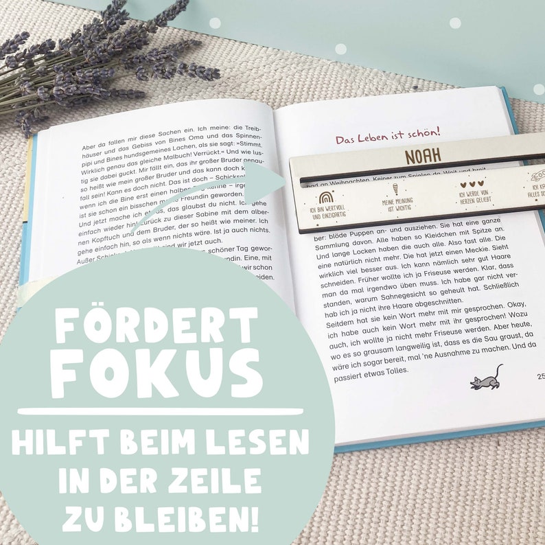 May include: A close-up of a book with the title "Das Leben ist sch&ouml;n!" and the name "Noah" on the cover. The book is open to a page with text about a child's experience with a friend and a doll. The book is designed to help children learn to focus while reading.