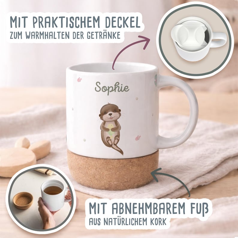 May include: White ceramic mug with a cartoon otter illustration, the name "Sophie", and pink accents. The mug has a removable cork base and a lid. Text on the mug reads "MIT PRAKTISCHEM DECKEL ZUM WARMHALTEN DER GETR&Auml;NKE" and "MIT ABNEHMBAREM FU&szlig; AUS NAT&Uuml;RLICHEM KORK".