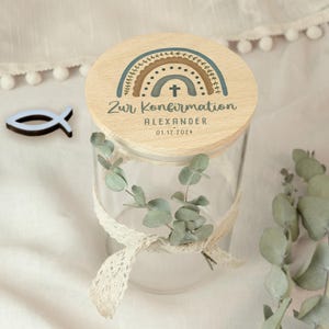 May include: A set of three ceramic mugs with a speckled, matte finish. The mugs are in shades of cream, light gray, and dark gray. Each mug has a simple, minimalist design, perfect for coffee or tea.