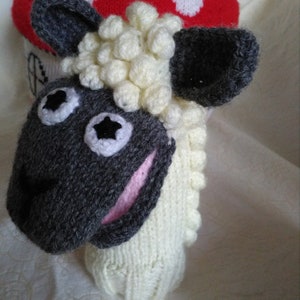Hand knitted children's sheep glove puppet