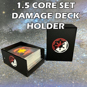 May include: Black plastic damage deck holder with a Rebel Alliance symbol. The holder is designed to fit 1.5 Core Set cards.