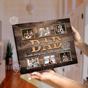 May include: A wood-grain canvas print with a collage of photos and the word "DAD" in large, wooden letters. The text below reads "No matter how big we get, we will always reach for you."