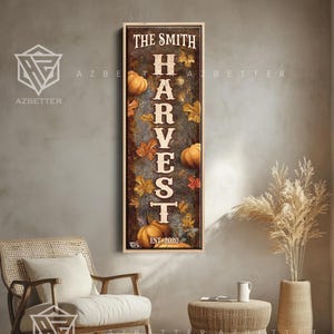 May include: A vertical wooden sign with the text "THE SMITH HARVEST EST 2020" in white lettering. The sign features pumpkins and fall leaves. The sign is displayed in a living room setting.