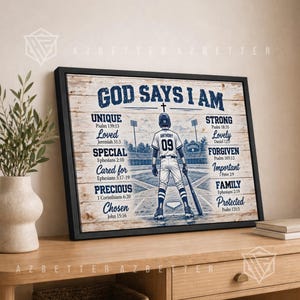 May include: A framed canvas print featuring a baseball player standing on a field with the text GOD SAYS I AM and various inspirational words like UNIQUE, LOVED, SPECIAL, CARED FOR, PRECIOUS, CHOSEN, STRONG, LOVELY, FORGIVEN, IMPORTANT, FAMILY, PROTECTED.