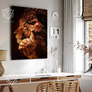 May include: A painting of a lion with a crown of thorns, with a man's face and hands visible behind the lion's head.