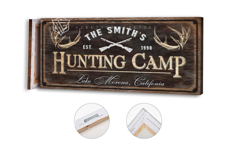 May include: A rustic wooden sign for "The Smith's Hunting Camp" with crossed rifles, antlers, and the text "Lake Morena, California." The sign is brown with white and tan lettering, and the year "1990" is included.