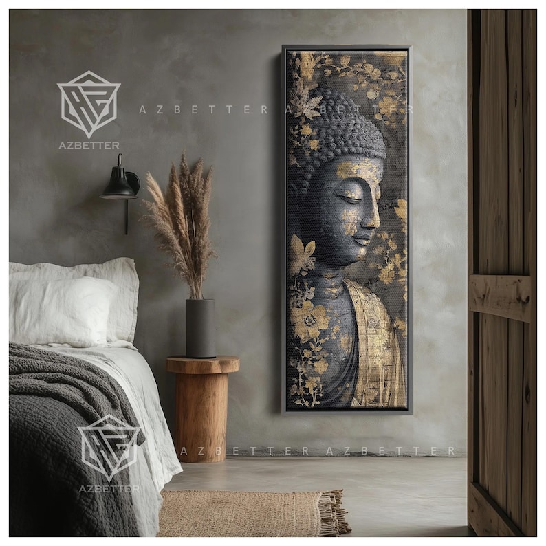 May include: A framed wall art piece featuring a serene Buddha image. The artwork showcases a dark gray Buddha with gold accents and floral details. The piece is displayed in a bedroom setting, adding a touch of tranquility.