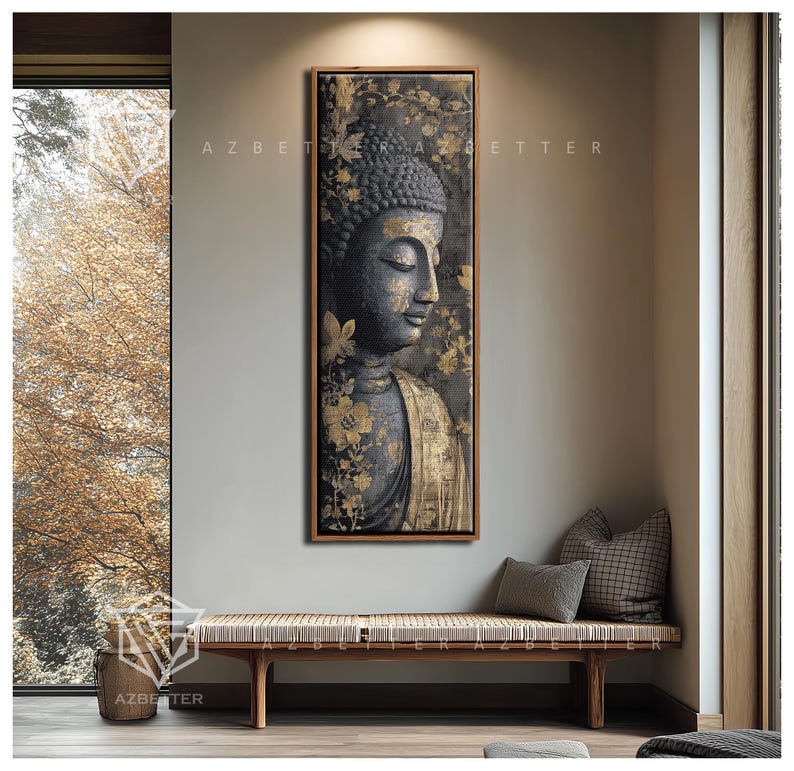 May include: A framed vertical canvas art print featuring a serene Buddha image. The artwork showcases a gray Buddha figure with gold accents, set against a dark background with floral patterns. The print is displayed above a wooden bench with pillows.