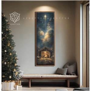 May include: A framed vertical artwork depicts a nativity scene under a starry sky. The painting features a stable with figures inside, surrounded by sheep. The artwork is set against a backdrop of clouds and a bright star, with the text "AZBETTER" visible.