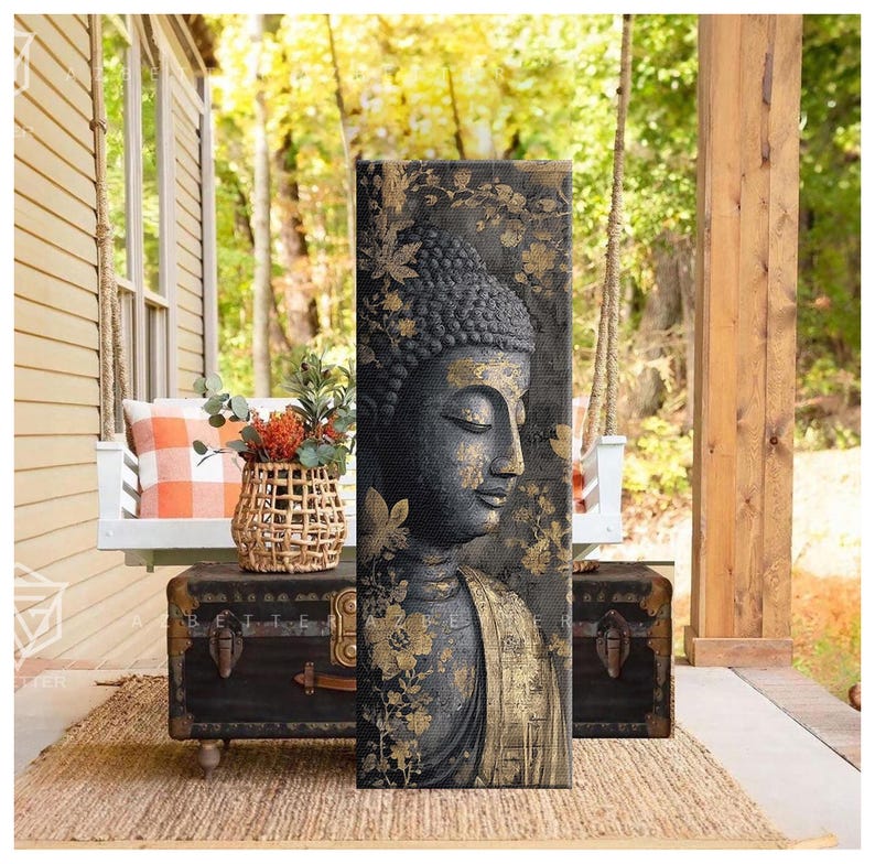 May include: A vertical canvas print featuring a serene Buddha image. The artwork showcases a dark gray Buddha with gold accents, including floral patterns. The Buddha's face is in profile, with closed eyes, conveying a sense of peace. The background is a blend of dark and gold tones.
