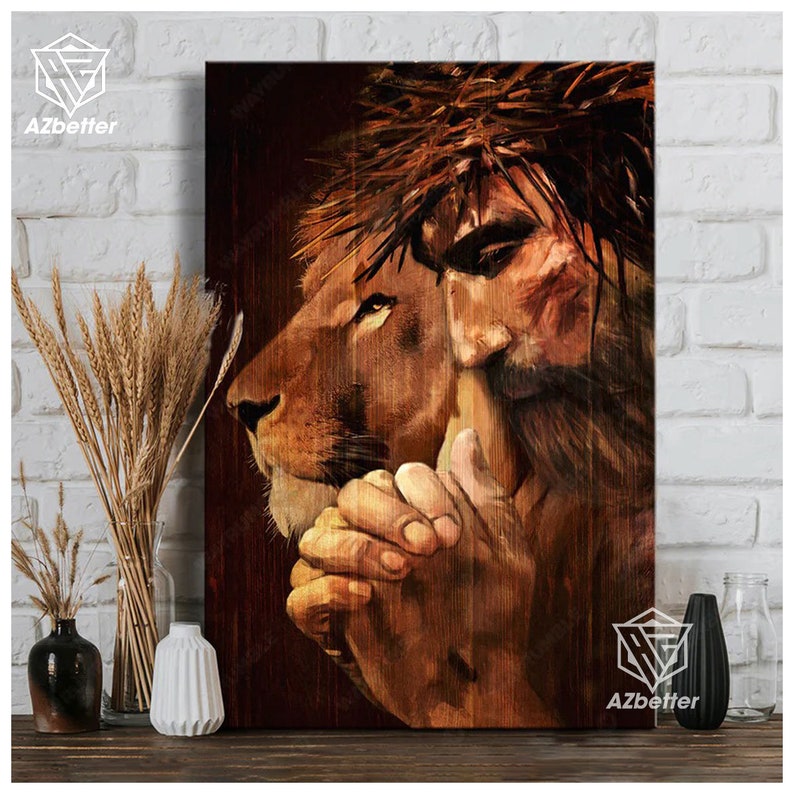 May include: A painting of Jesus with a crown of thorns, his face is partially obscured by a lion's head. The lion's head is facing to the left, and the lion's eyes are open. The background is a dark brown wood grain.