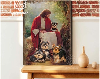 May include: A painting of Jesus sitting on a rock with four small Yorkshire Terrier dogs. Jesus is wearing a red robe and the dogs are looking up at him. The painting has a rustic, vintage look.
