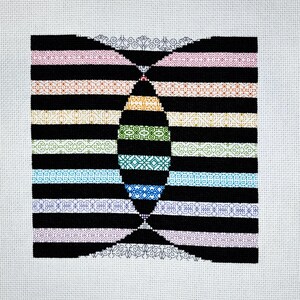 May include: A black and white cross-stitch pattern with a rainbow of colors in the center. The pattern is made up of different geometric shapes and designs.