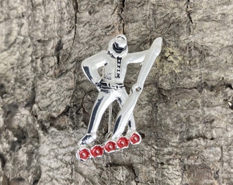 Broche de aviador con flor roja de amapola en recuerdo