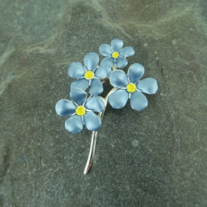 Forget me not blue flower brooch jewellery gift by ATLondonJewels on slate.