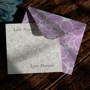 ATLondonJewels Jewellery Fully Recyclable Packaging. A Pretty lilac envelope with the jewellery presentation card placed on top, with the words Love Nature Love Flowers