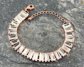 Pulsera de cristal tono oro rosa en caja de regalo