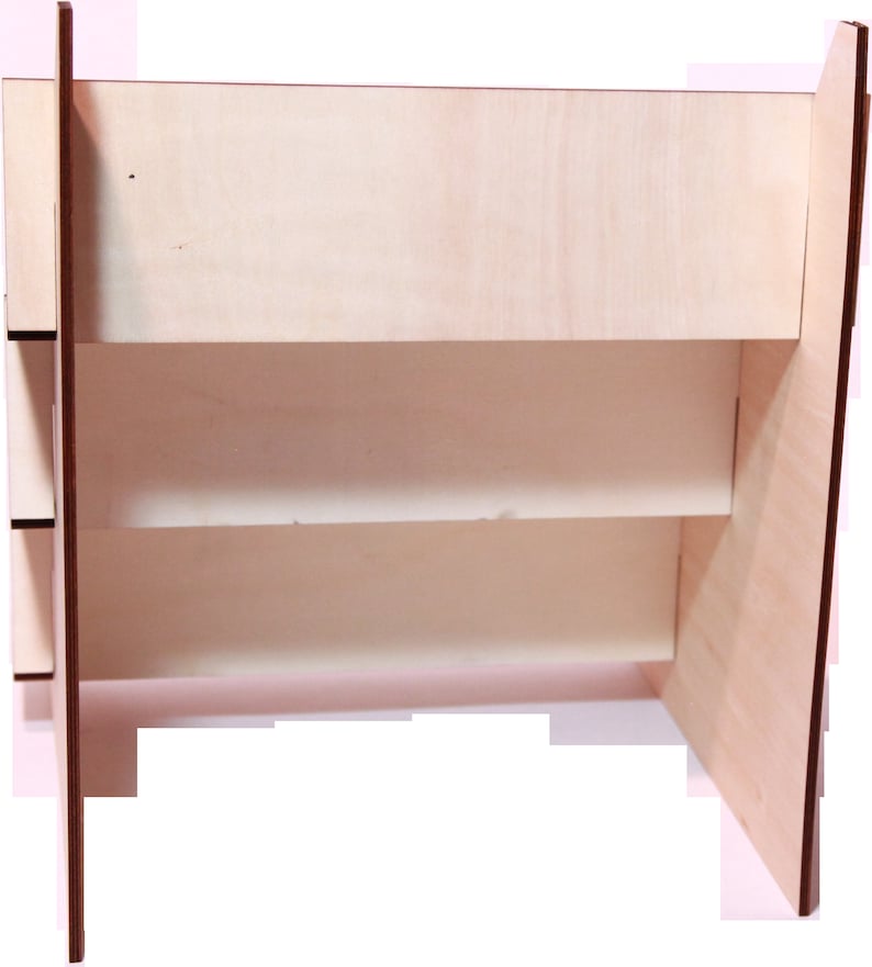 May include: A wooden shelf unit with three shelves. The shelves are made of light wood and the unit has a natural wood finish.