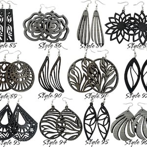 May include: A selection of wooden earrings in diverse designs, such as geometric, floral, and abstract forms. The earrings are in shades of grey and black, with silver-coloured hooks. Styles are labelled 85 to 96.