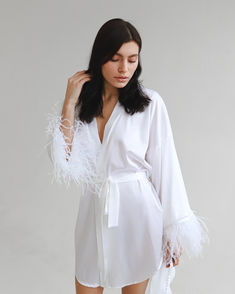 flowy robe with feathers