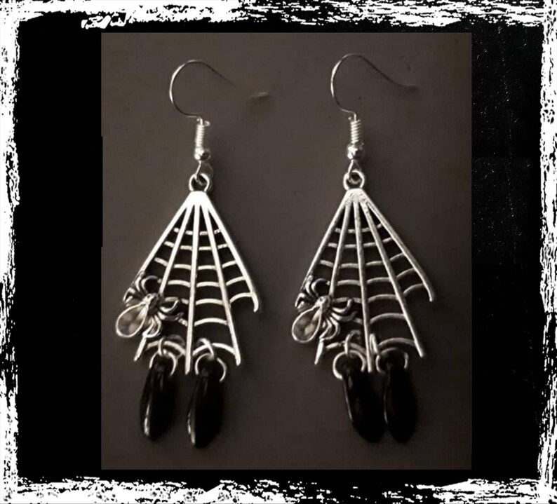 Spider in web teardrop earrings