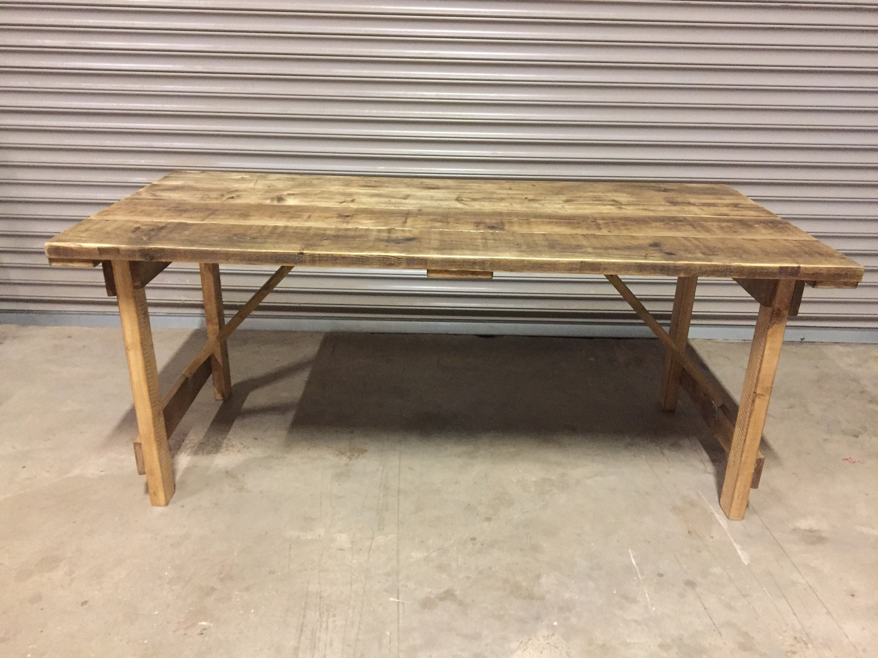 Folding trestle dining table deals