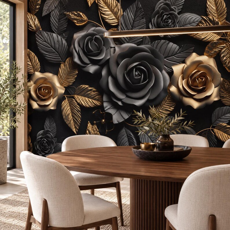 May include: A round wooden dining table with a fluted base and four cream-colored upholstered chairs. The wall behind features a large-scale three-dimensional floral mural with matte black and metallic gold roses and leaves.
